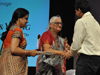 Mr.C.K.Ranganathan felicitating Smt.Mohini Giri