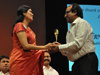 Ms.Jayshree Raveendran felicitating Shri. Shravan Garg