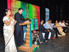 Sheela painting as the music enthralls the audience