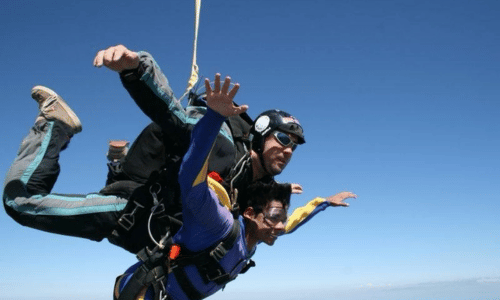 Saiprasad skydiving in mid-air.