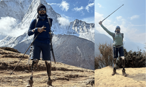 Tinkesh standing at the summit of Mount Everest.